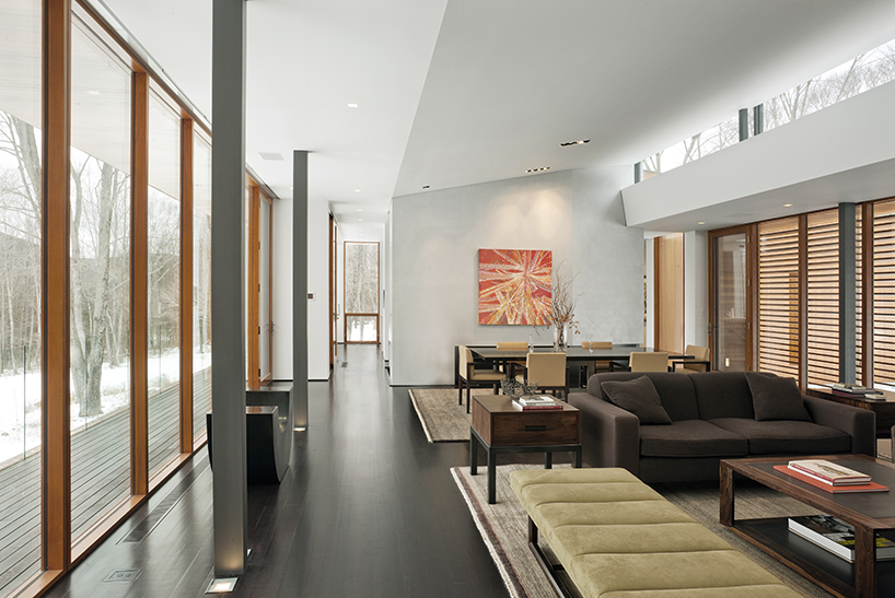 joeb moore + partners spans bridge house over landscape