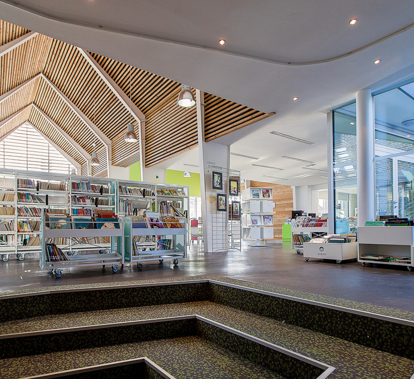 bplusb architectures adds gable-roof to dainville library