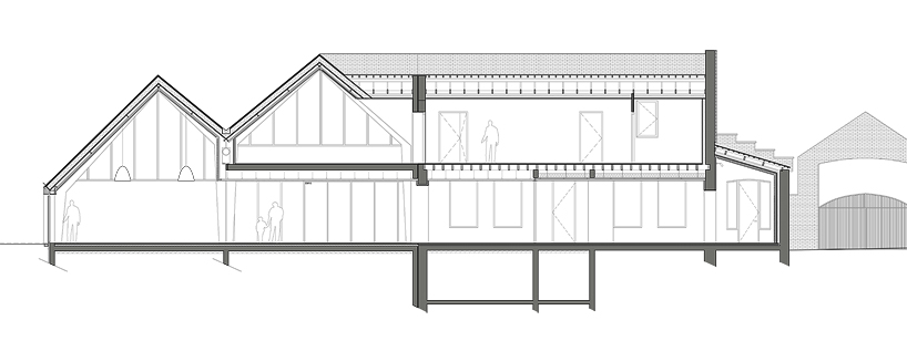 bplusb architectures adds gable-roof to dainville library