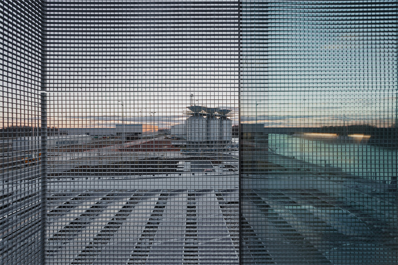 sporaarchitects' control building for the gyor-gonyu port overlooks the danube river