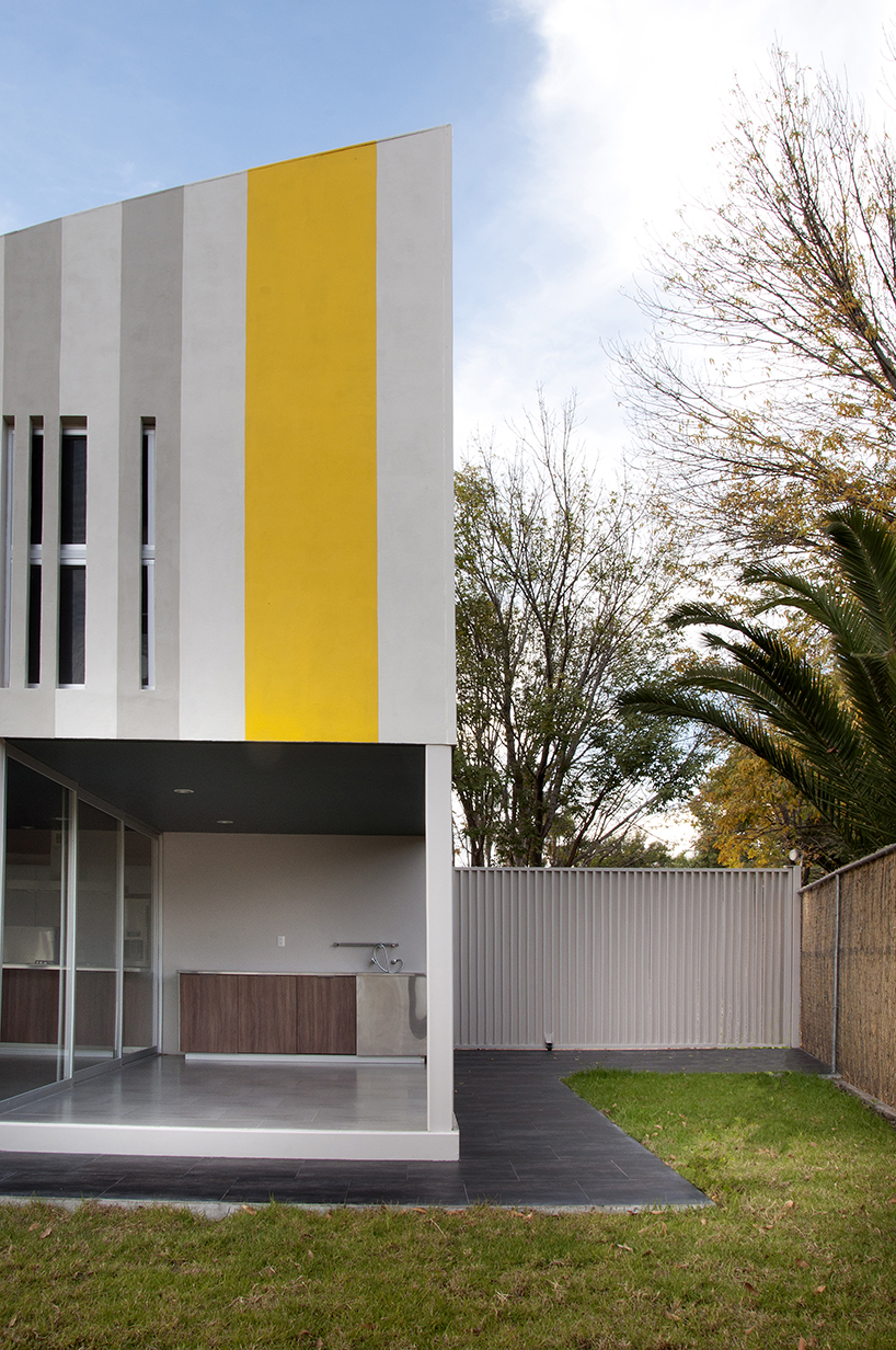 tactic-a angles striped huit house around L shape in mexico
