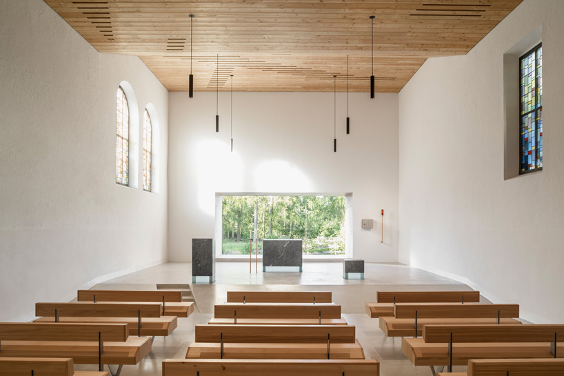 messner architects situates its newly renovated saint joseph chapel in the alpine woods