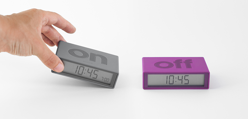 adrian + jeremy wright create fun flip alarm clock for lexon