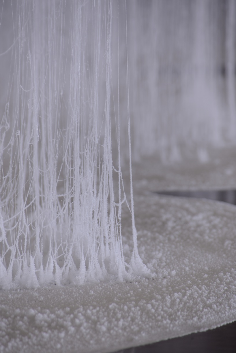 yasuaki onishi unites rope, glue and crystals for vertical emptiness