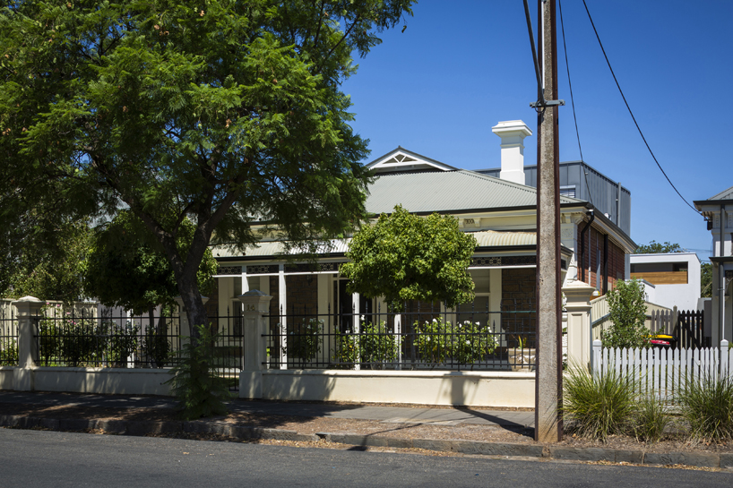 dimitty andersen architects floats curved extension over rose park residence
