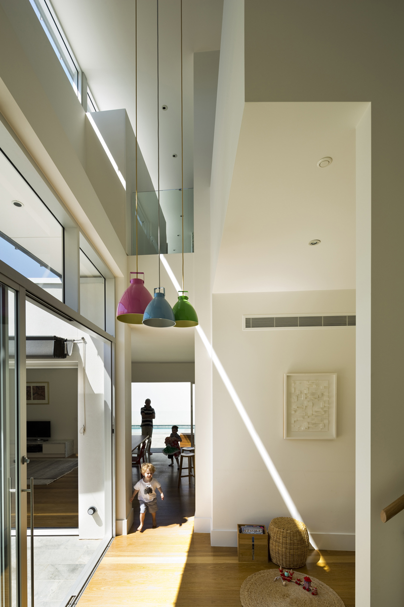 dimitty andersen architects floats curved extension over rose park residence