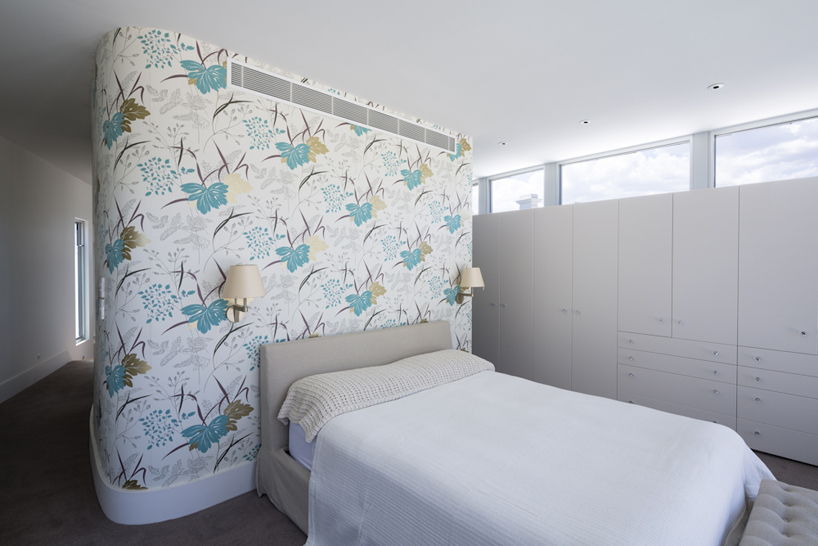 dimitty andersen architects floats curved extension over rose park residence