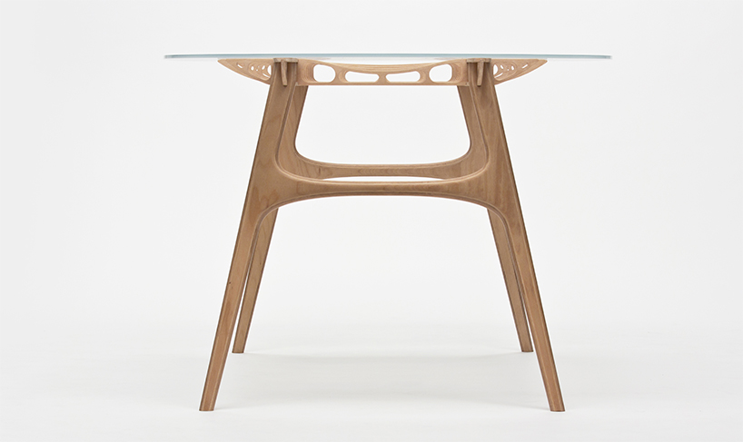 manfred table explores the sculptural structure of wooden airplane wings manfred table francesco frulio stefan lechner and samuele miatello designboom