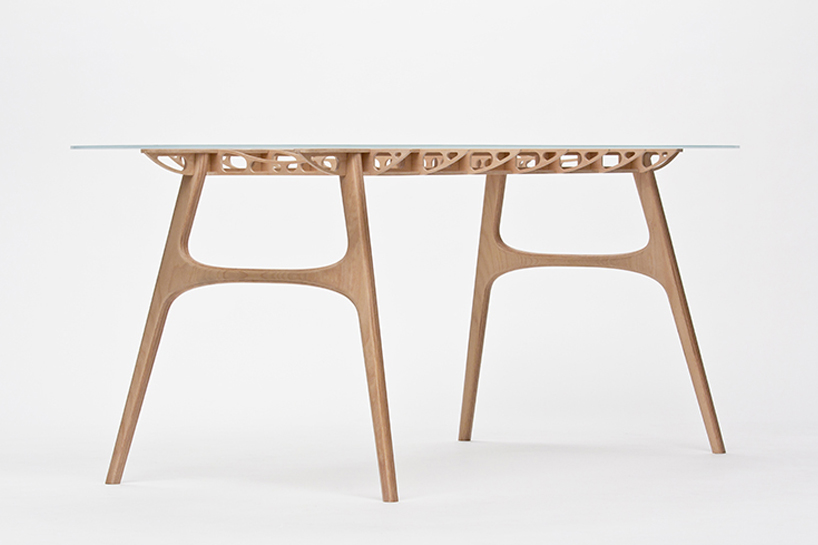 manfred table explores the sculptural structure of wooden airplane wings manfred table francesco frulio stefan lechner and samuele miatello designboom