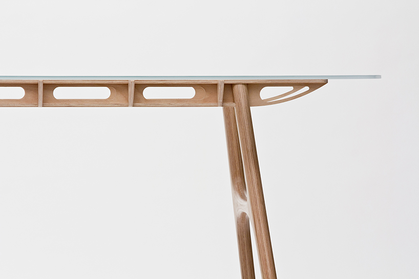 manfred table explores the sculptural structure of wooden airplane wings manfred table francesco frulio stefan lechner and samuele miatello designboom