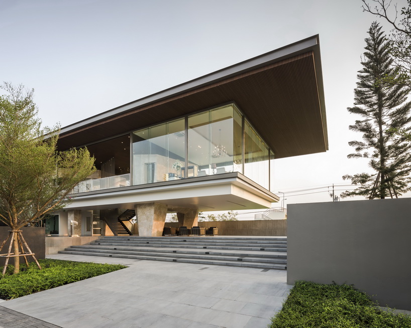 office at floats transparent box over stone formations for the grand ...