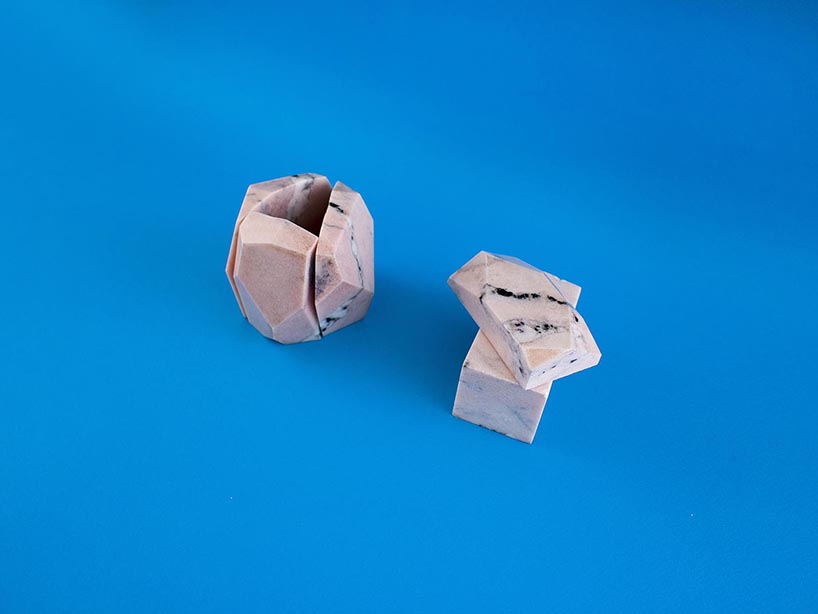 jinsik kim cuts stone age desk pieces from italian pink aurora