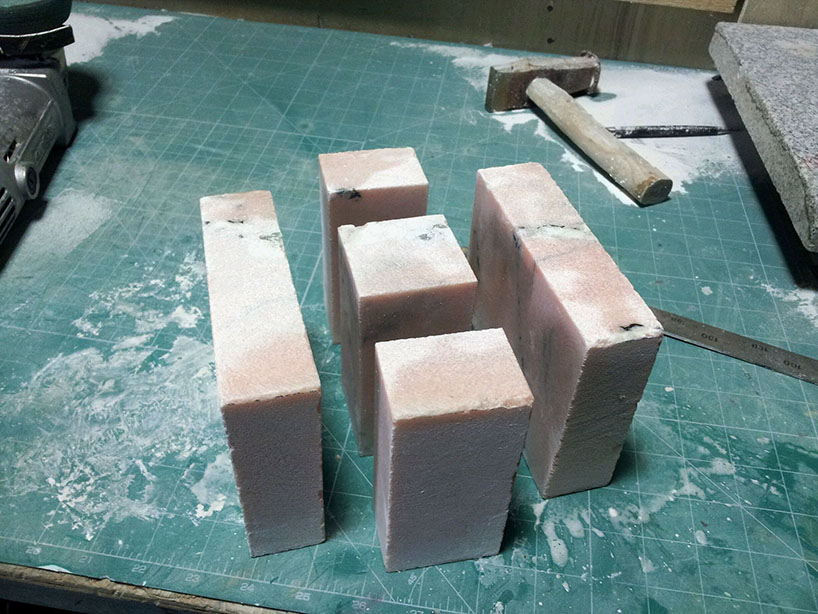 jinsik kim cuts stone age desk pieces from italian pink aurora