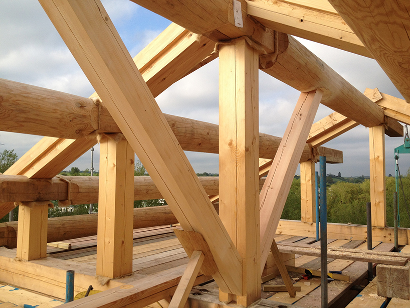 fram build mimics upturned viking boat in riverside clubhouse 