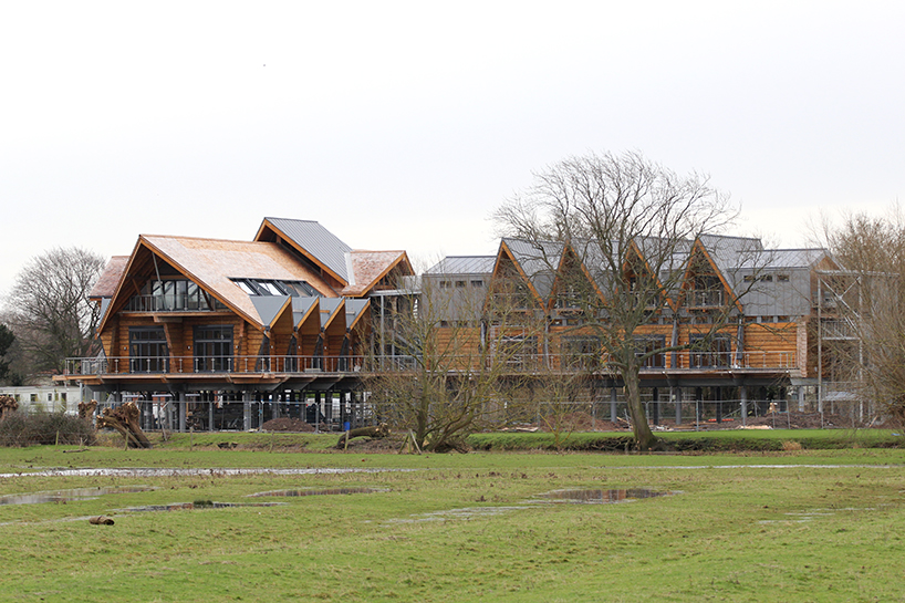 fram build mimics upturned viking boat in riverside clubhouse 