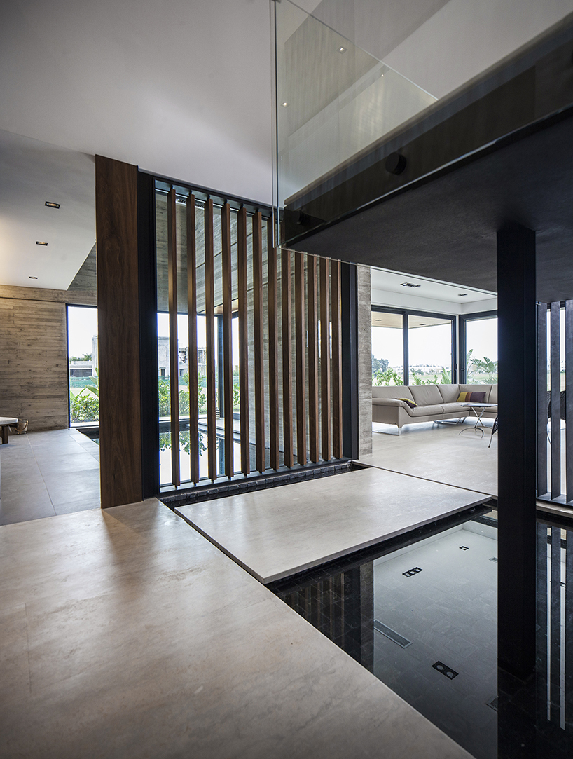 REMY's FSY house in buenos aires uses an exemplary balance of noble materials