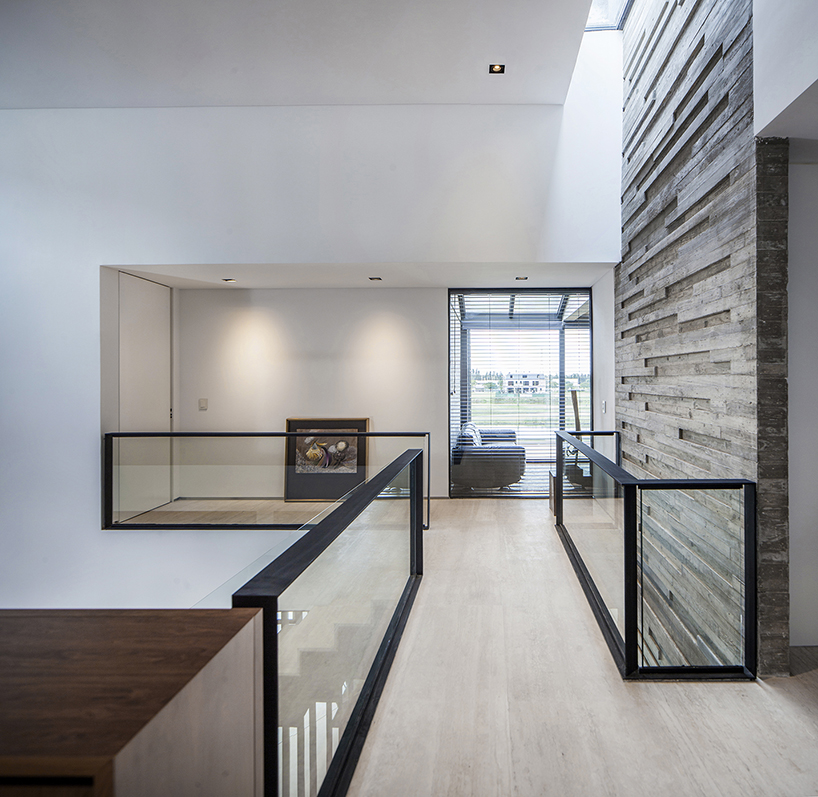 REMY's FSY house in buenos aires uses an exemplary balance of noble materials
