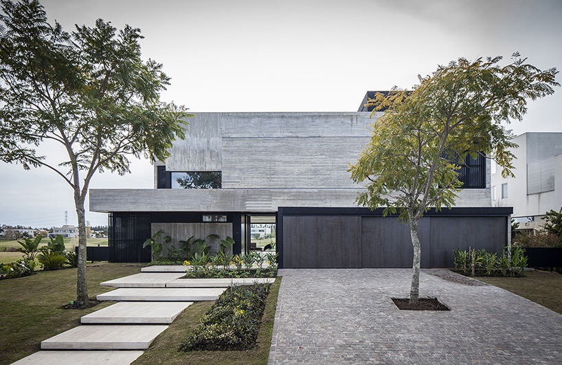 REMY's FSY house in buenos aires uses an exemplary balance of noble materials