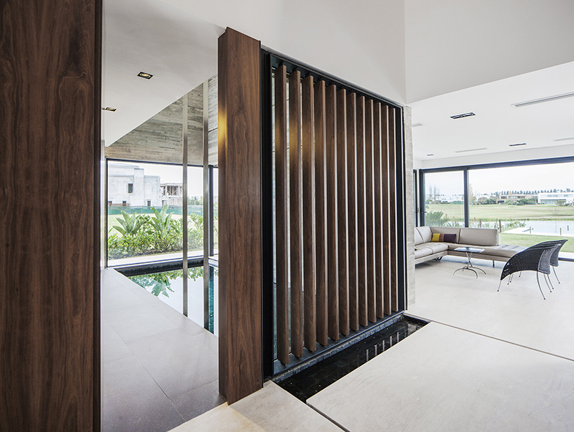 REMY's FSY house in buenos aires uses an exemplary balance of noble materials