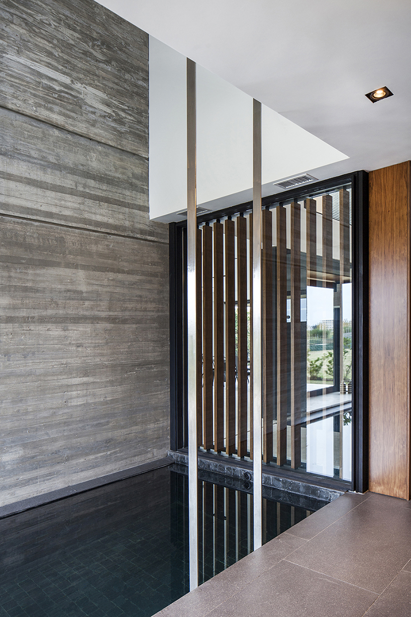 REMY's FSY house in buenos aires uses an exemplary balance of noble materials