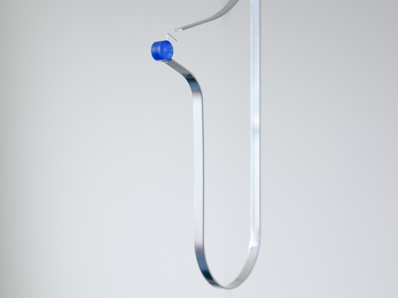 water droplets become conduits for electrical energy in sander hagelaar’s installation