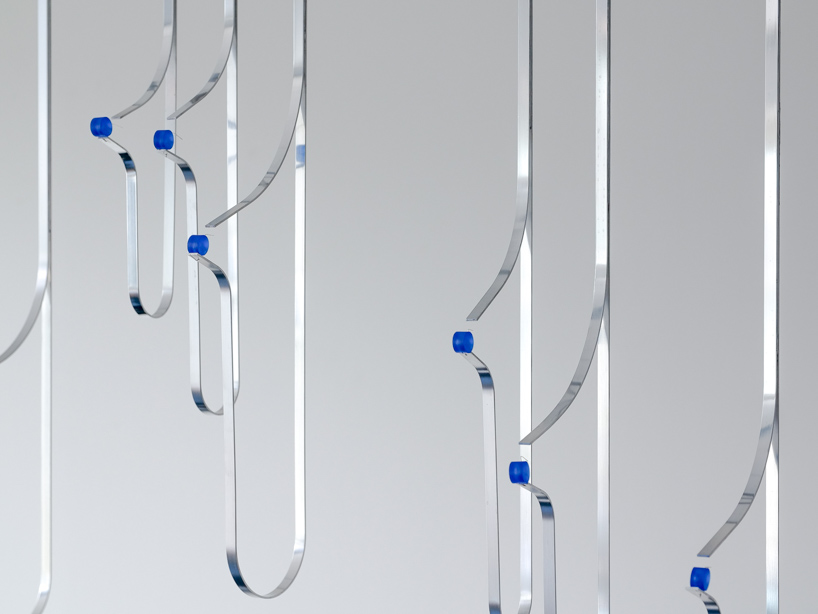 water droplets become conduits for electrical energy in sander hagelaar’s installation