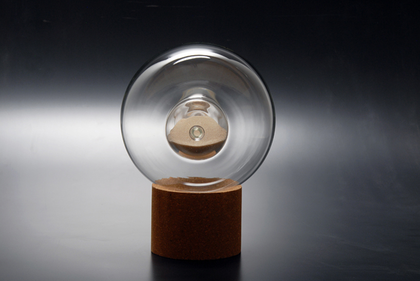 aric snee develops contemplative hourglass for holmegaard