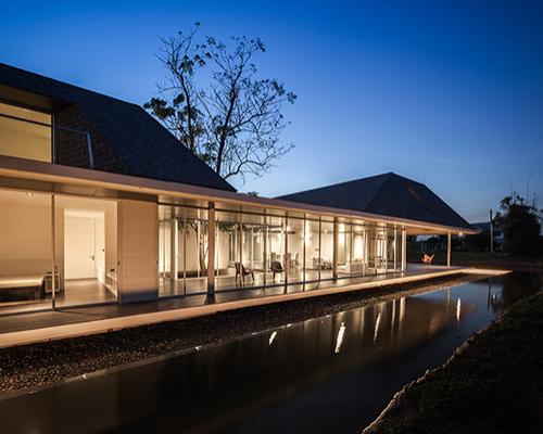 thai house by sook architects is constructed around a native tree