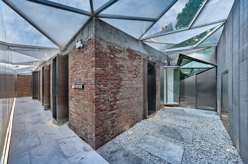 cutscapearchitecture inserts red-wall teahouse into the forbidden city in beijing