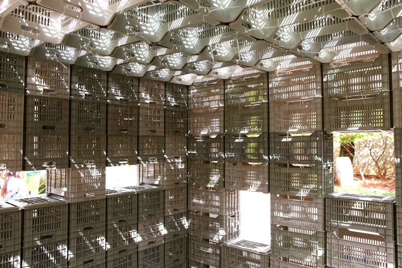 LAU architecture students assemble emergency shelter with plastic crates + ties