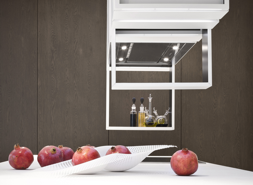 the cut by alessandro isola is a reconfigurable kitchen with sliding units