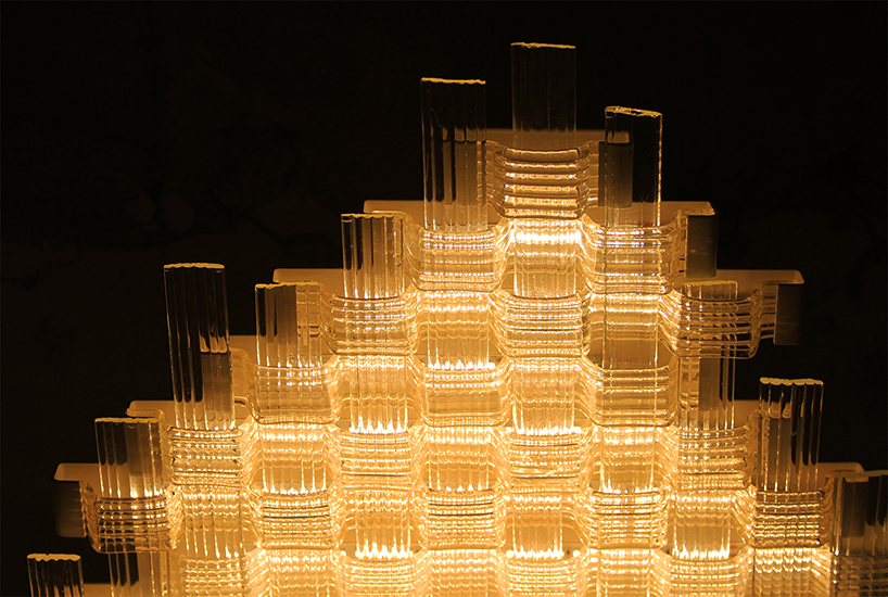 coma studio weaves lace nº1 light into glowing cloud formation