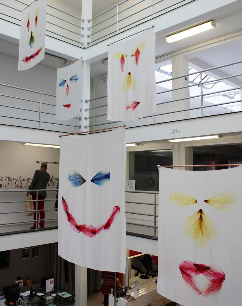 hilde koenders composes silk faces series using dried tulip petals