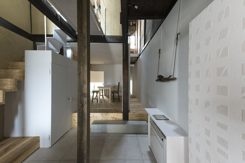 td-atelier refurbishes century-old japanese guesthouse with modern interventions