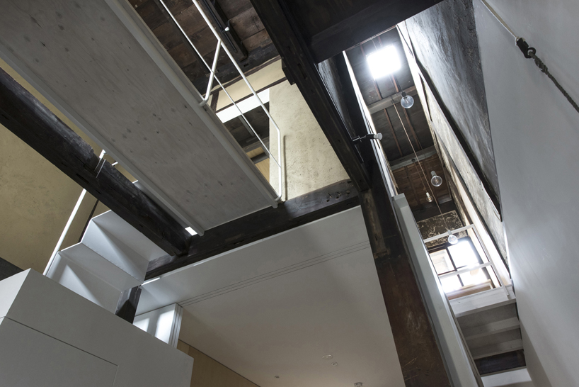 td-atelier refurbishes century-old japanese guesthouse with modern interventions
