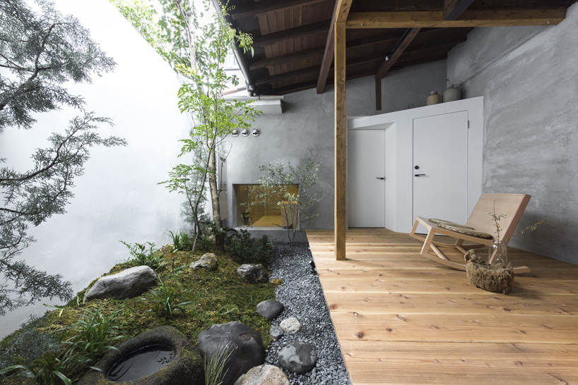 td-atelier refurbishes century-old japanese guesthouse with modern interventions