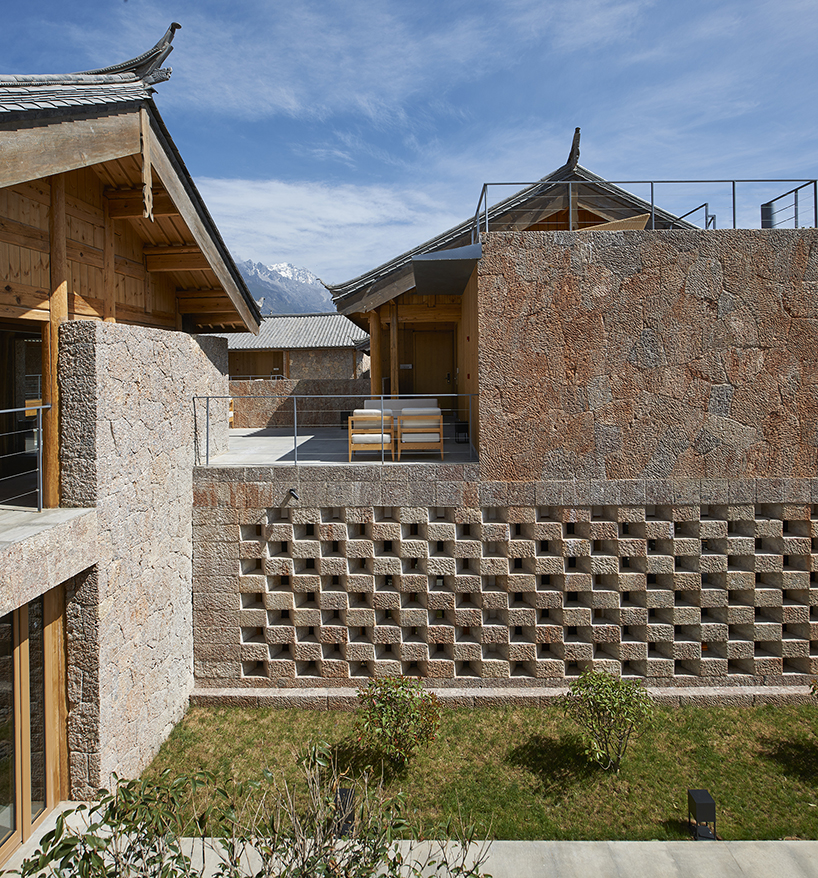 yoshimasa tsutsumi renovates and extends chinese housing into tsingpu baisha retreat hotel