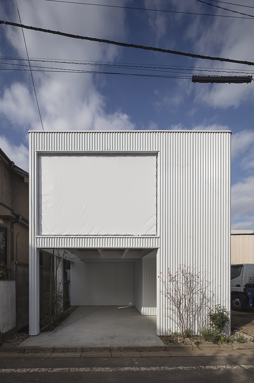 arbol design connects two family houses in tokyo with bauhaus-inspired garage designboom
