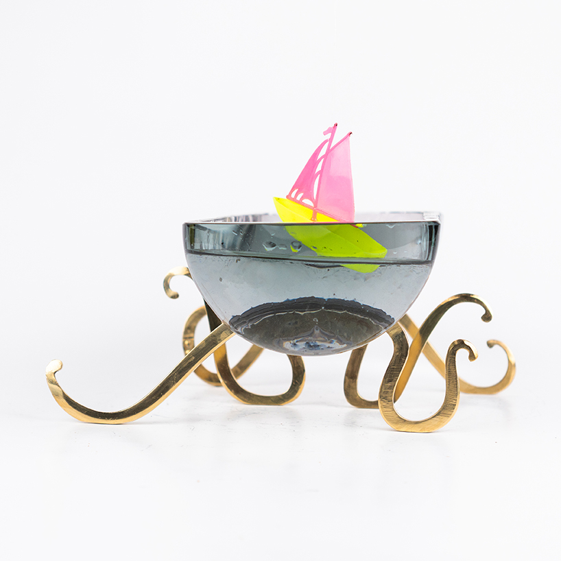 hellène gaulier combines blown glass and brass to create unique vessels