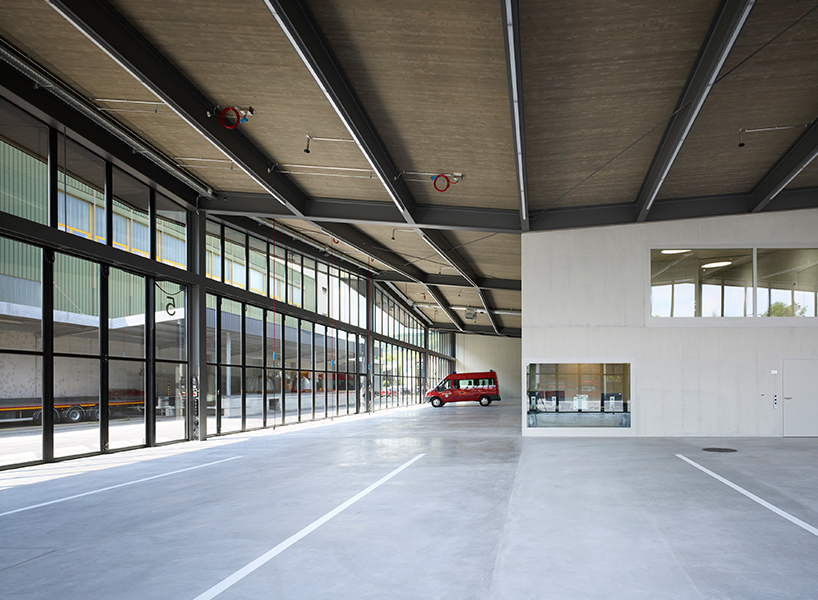 kit architects' fire station in switzerland rises as a cultivated industrial building