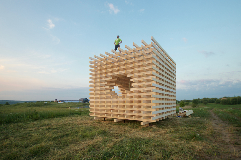 totan's CUBOED pavilion in russia allows nature to interlace its structure