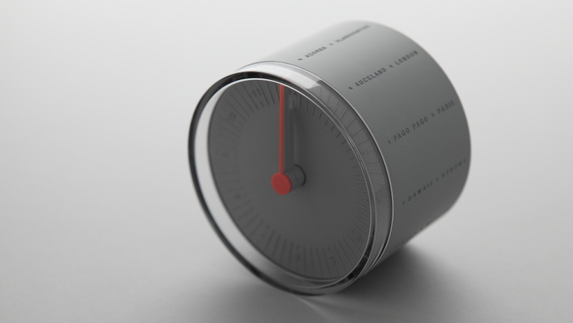 cylindrical world clock by elevenplus rolls to display 24 different time zones