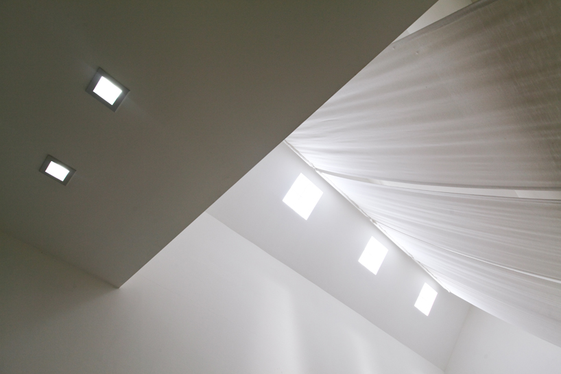 EKAR architects t-house thailand designboom