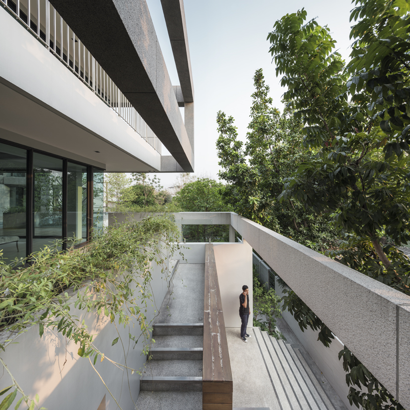 EKAR's traditional thai-inspired house in bangkok is designed to suit all generations
