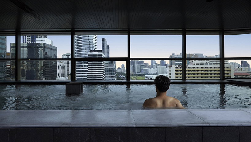  Asterisk skyscraper public baths frame the view of the city of Bangkok 