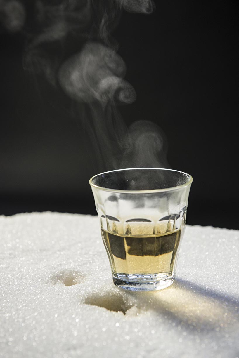 atelier 010 critiques consumer culture with crumbling tables of sugar