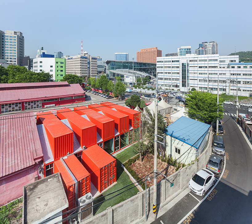 URBANTAINER extends the national theater company of korea with modulated red shipping containers
