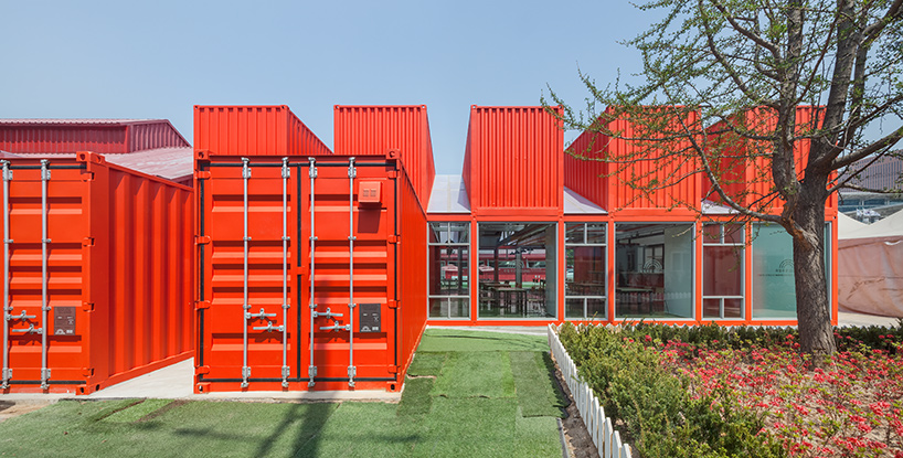 URBANTAINER extends the national theater company of korea with modulated red shipping containers