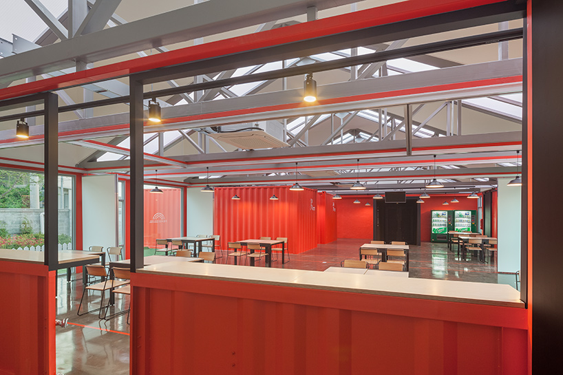 URBANTAINER extends the national theater company of korea with modulated red shipping containers