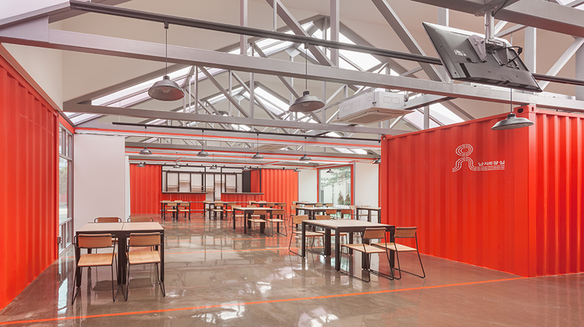 URBANTAINER extends the national theater company of korea with modulated red shipping containers